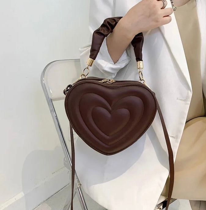 Small heart shaped handbag with detachable crossbody strap – The Out Of  Reach