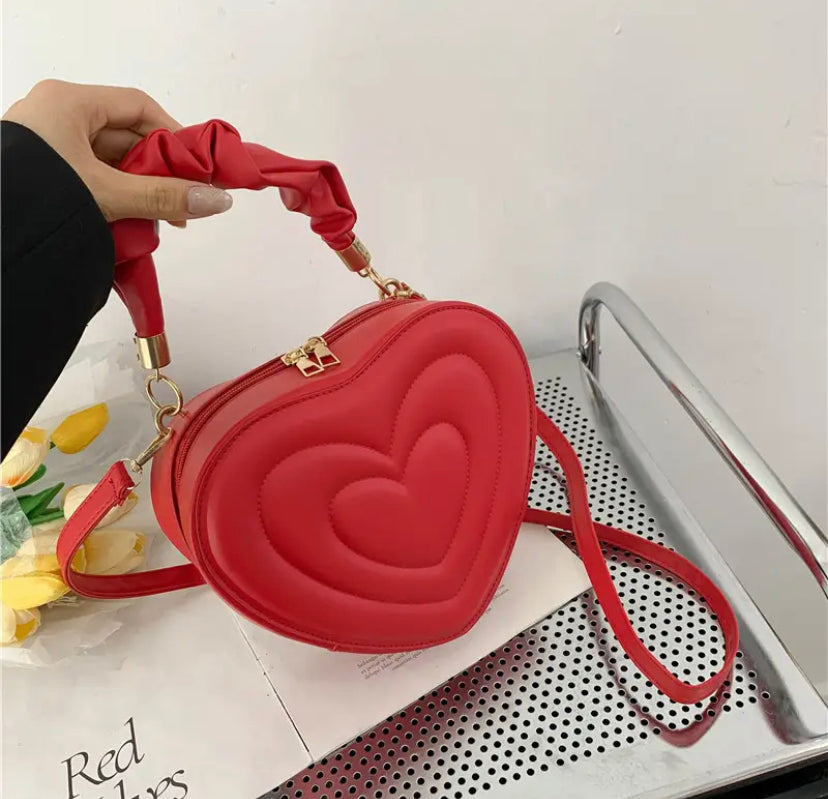 Small heart shaped handbag with detachable crossbody strap – The